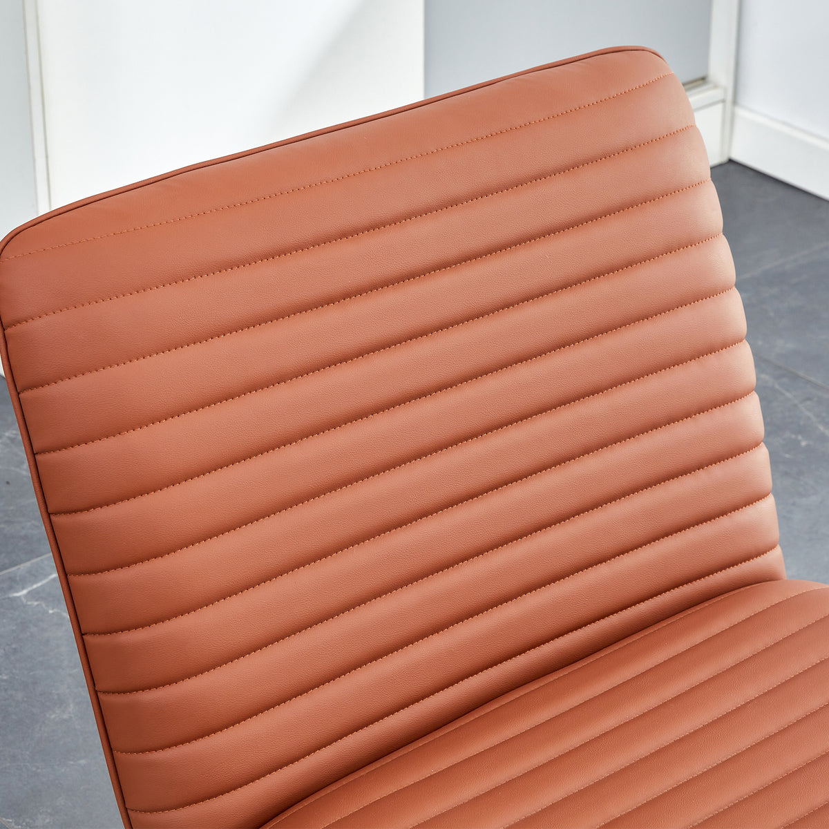Brown Armless Lounge Chair – Black Legs